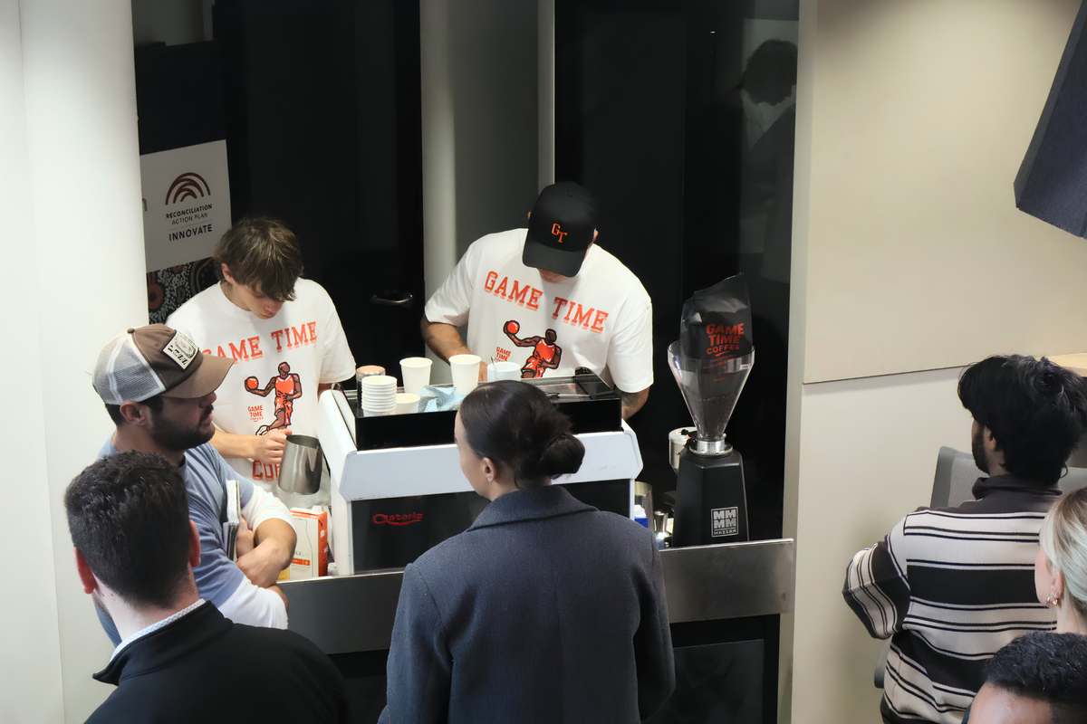 Game Time baristas serving a crowd at a workplace event